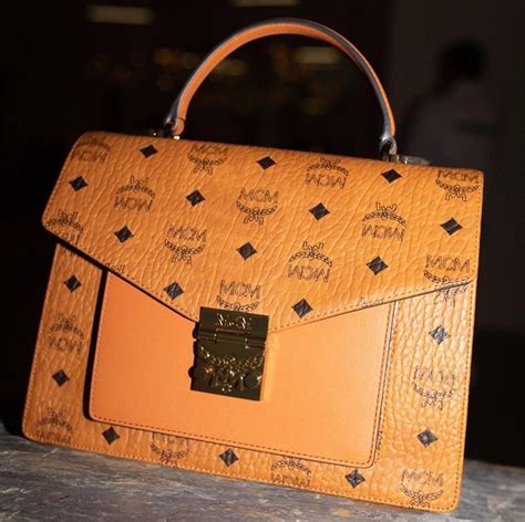 how to identify a fake mcm bag|bag mcm original.